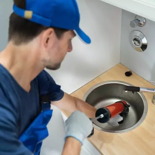 Drain Cleaning Livermore Plumber Completing a Drain Cleaning in Livermore, CA